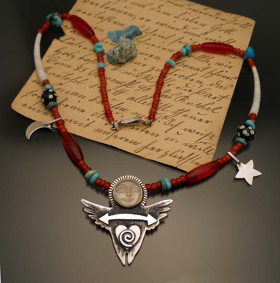 Pendant with old trade beads and turquoise